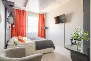 Отель Hotelli Raahen Hovi Раахе Улучшенный двухместный номер с 2 отдельными кроватями-1